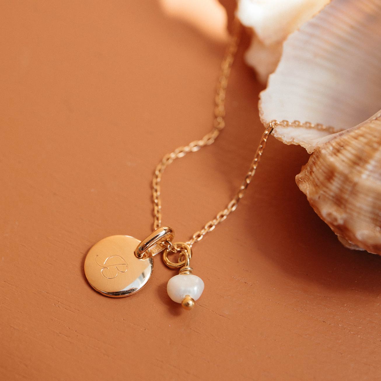 Collana bambino iniziale e perla