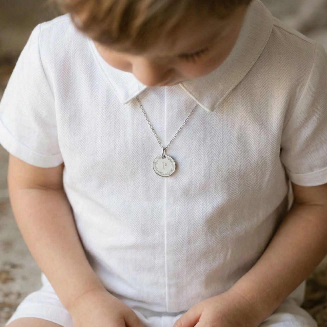 Medaglia battesimo personalizzata corona di foglie