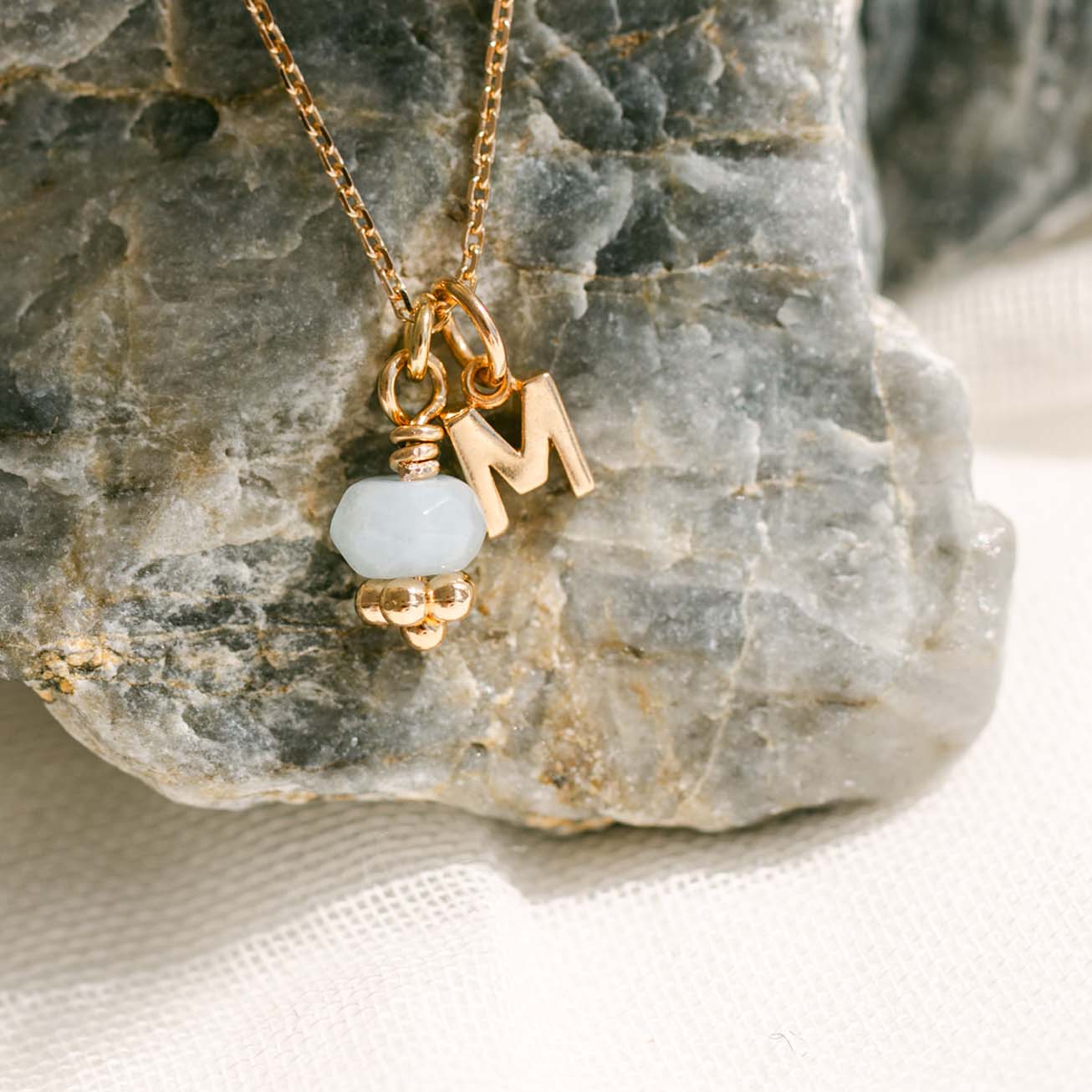 Collana iniziale acquamarina oro