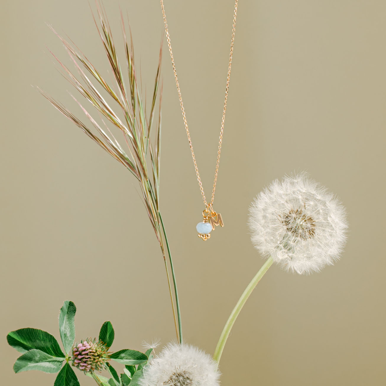 Collana iniziale acquamarina oro